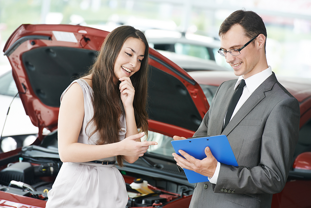 two people talking over Auto Insurance in Cerritos 